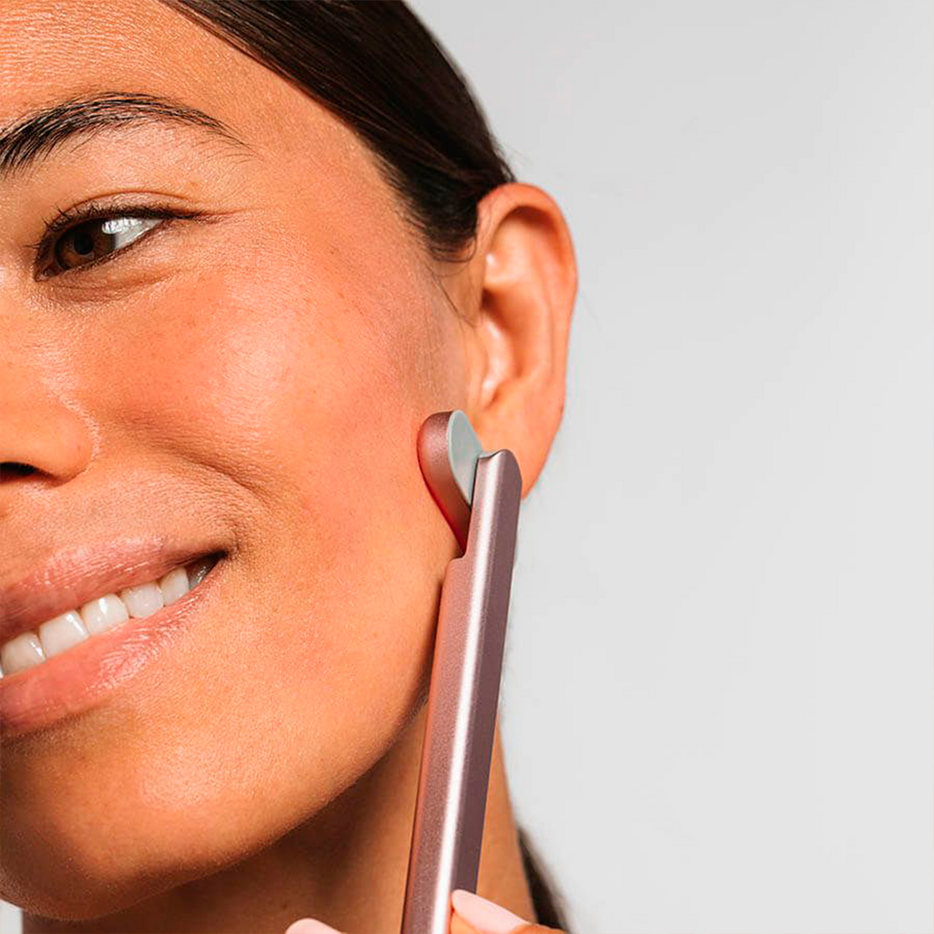 ReviSkin™ - Masajeador Facial con luz roja LED